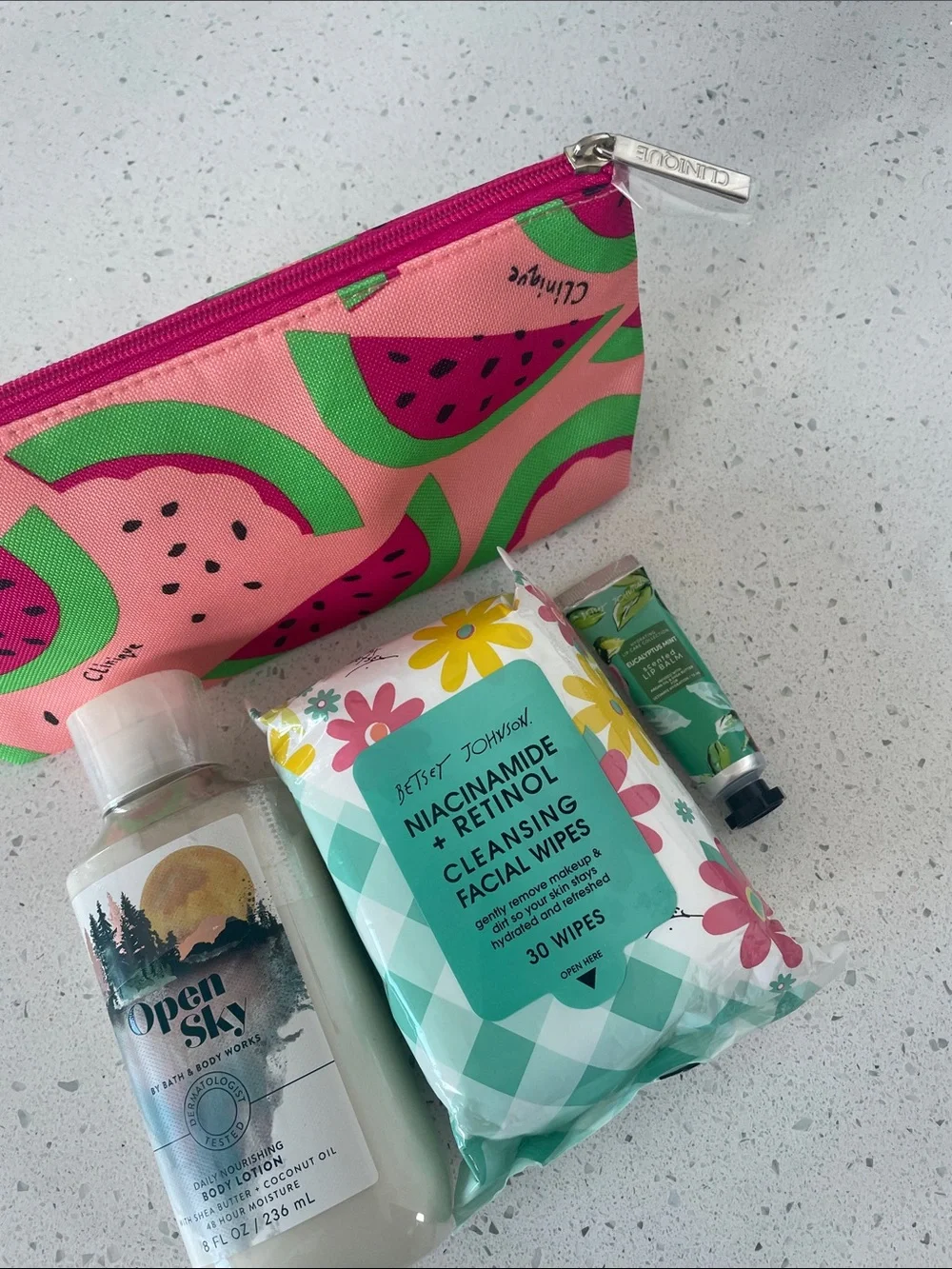 Bundle -Clinique Makeup bag, BBW lotion, Betsey Johnson face wipes, and lip balm